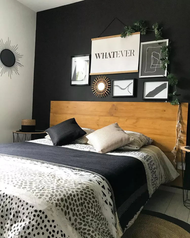 Black bedroom with wooden panel
