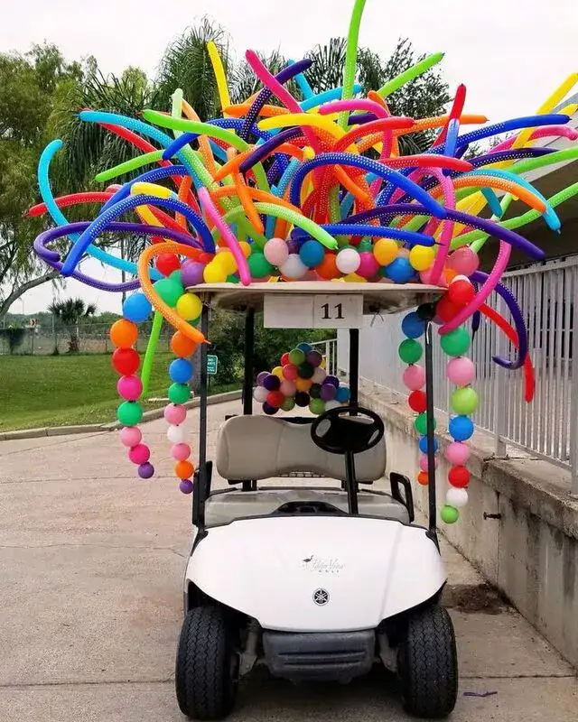 Decorate golf cart for halloween with balloons
