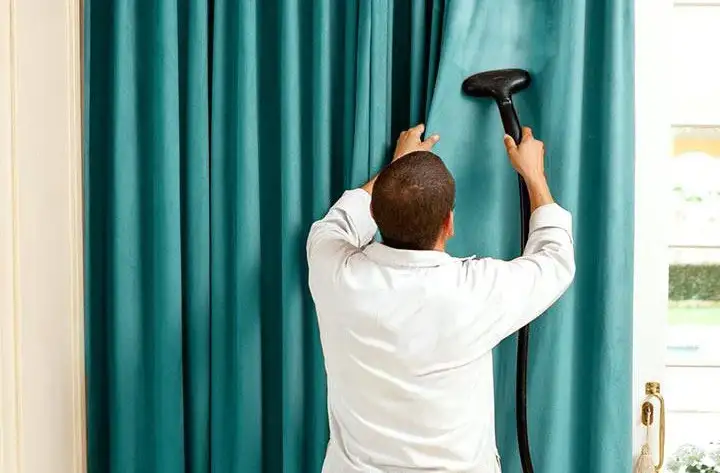 Vacuuming blackout curtains