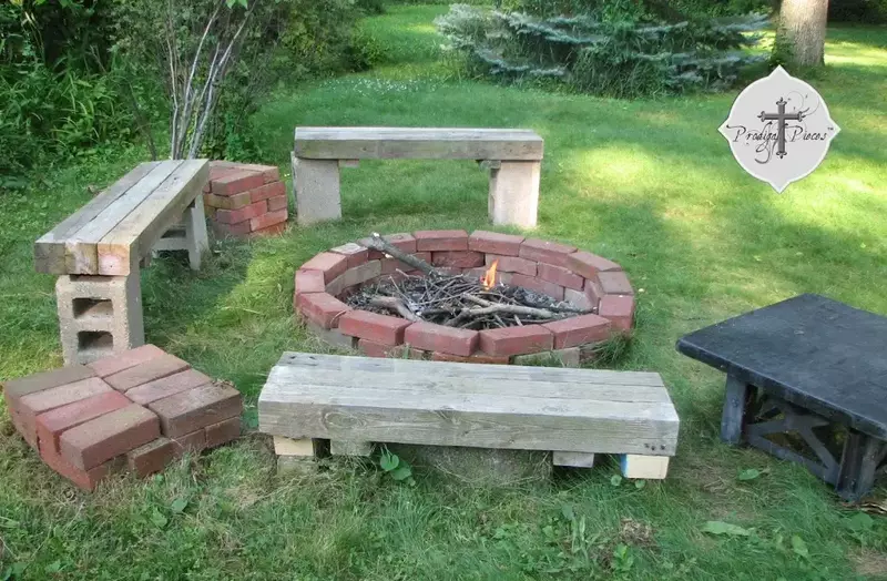 A reclaimed brick fire pit with a circular design