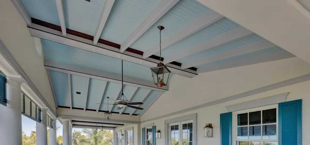 Traditional light blue beadboard porch ceiling