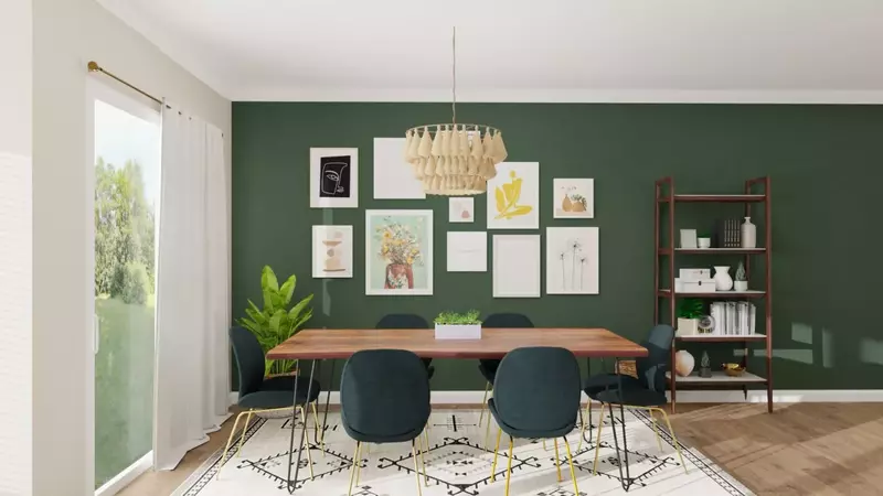 A dining room featuring a gallery wall of various art pieces and family photos.