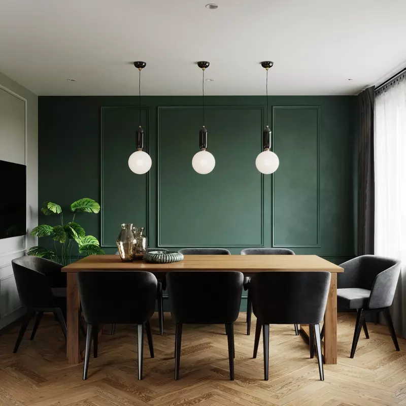 A dining room featuring a striking emerald green accent wall.
