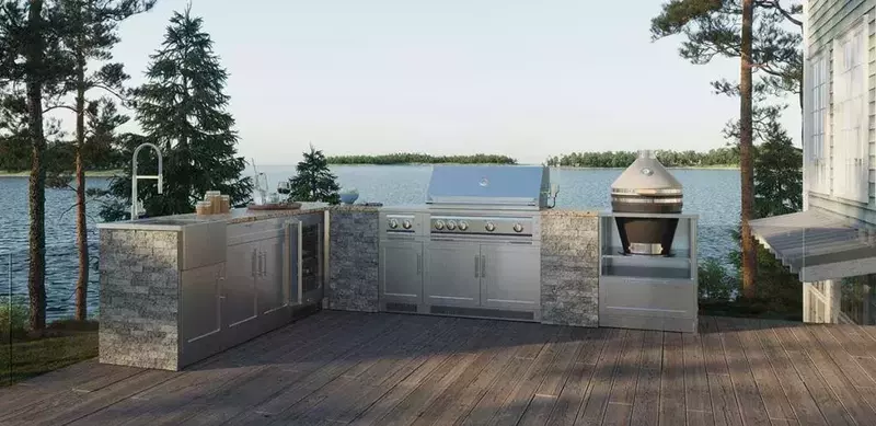 Stone outdoor kitchen perfectly integrated on a wooden deck
