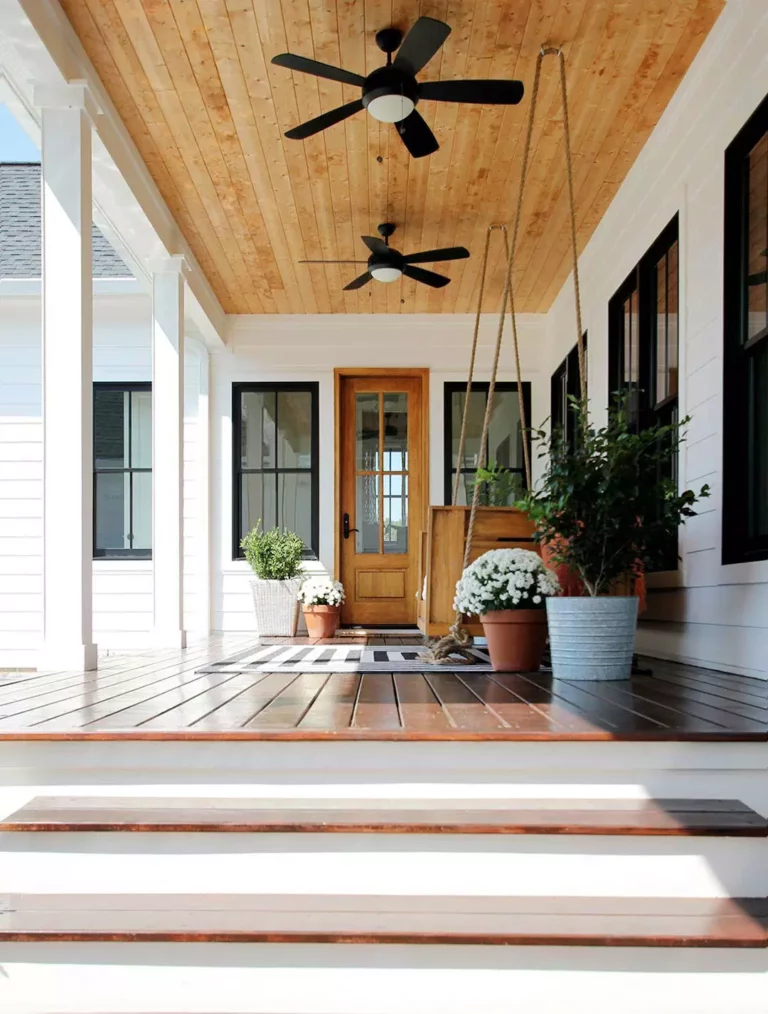 Stylish porch ceiling with elegant lighting fixtures