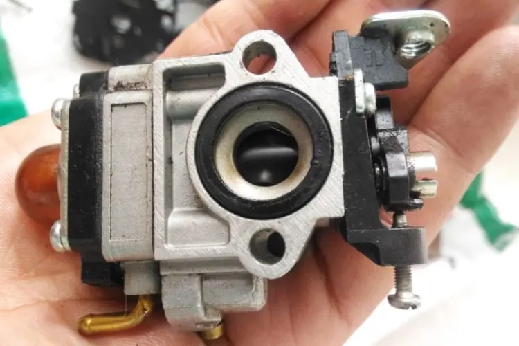 lawn mower carburetor and its functions.